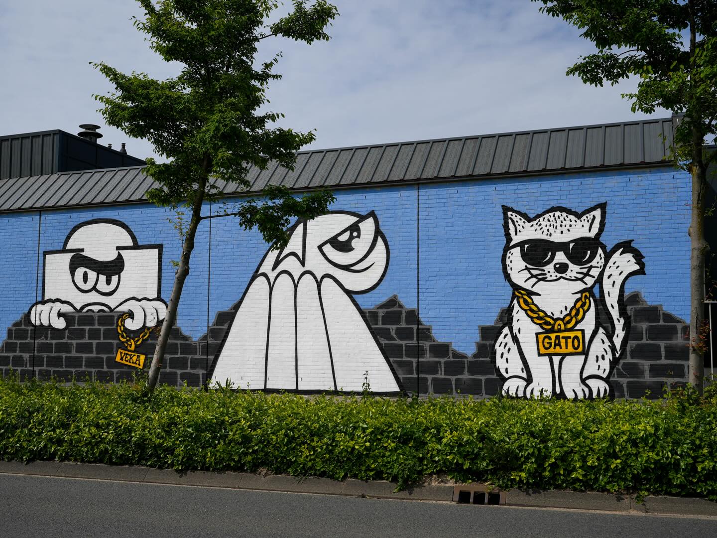 Een groot gezamenlijk streetartwerk met Gato en andere figuren